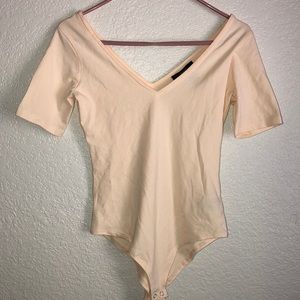 Beige body suit